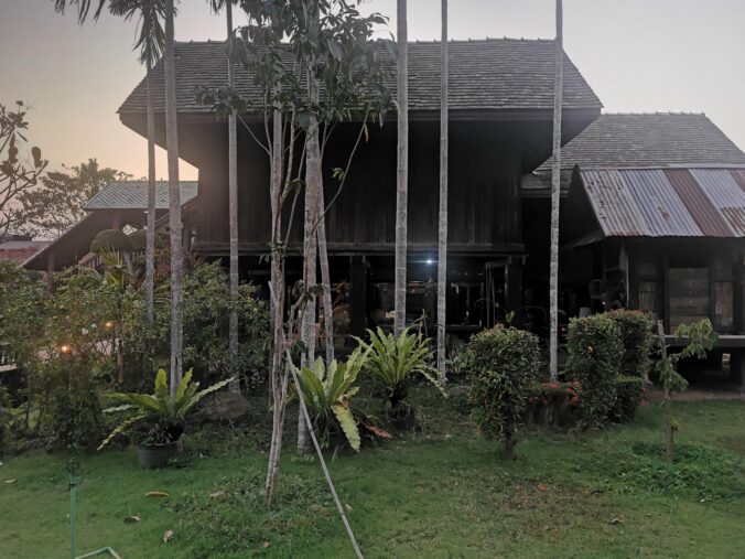 Holding Rice - A story by Graham Lawrence. The picture shows a traditional farmhouse